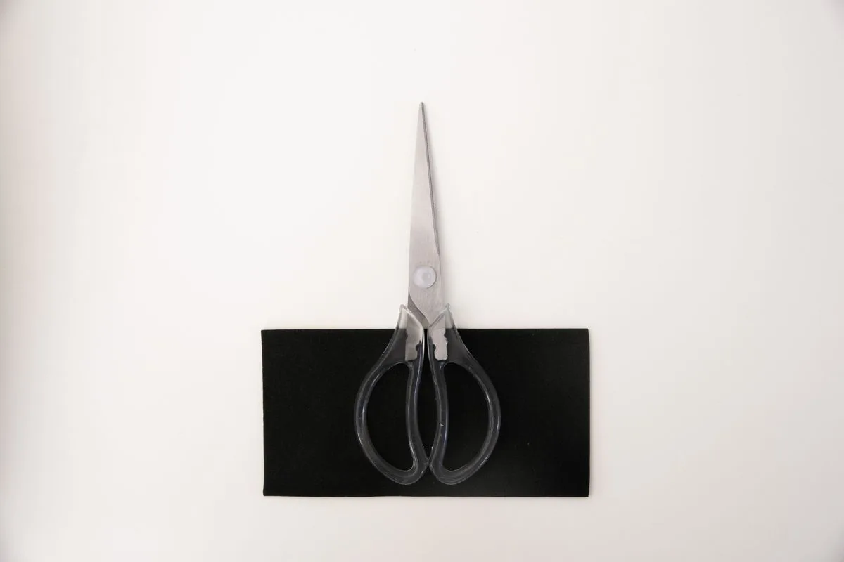 Office scissors on a clean neutral background